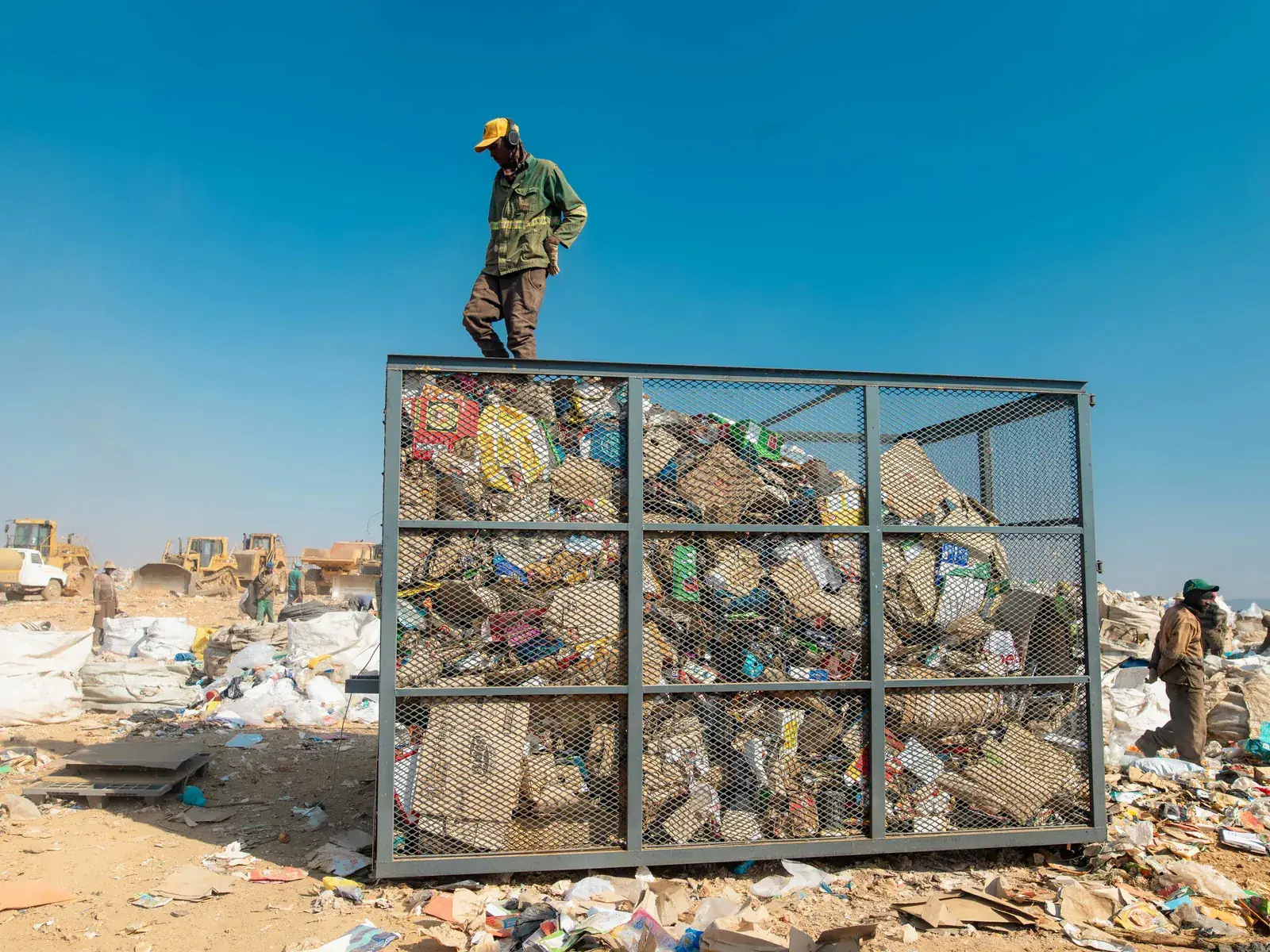 A full Murero mesh cage packed with sorted plastic and fibre.