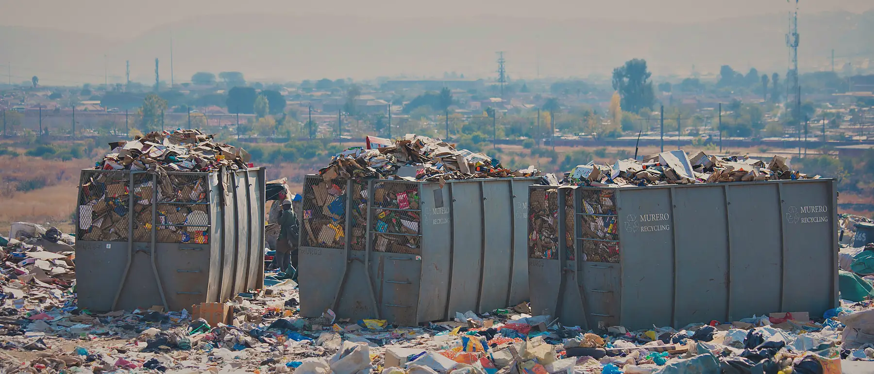 A row of Murero mesh cages filled with sorted material at the Pretoria sorting site.